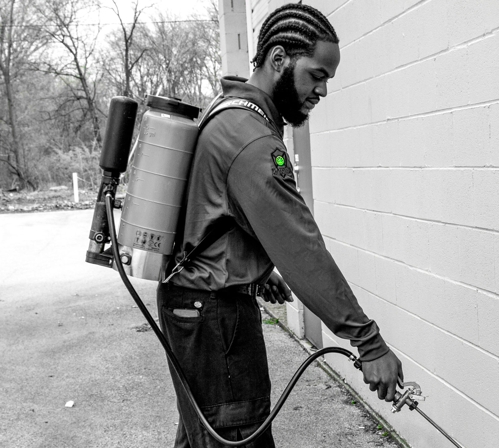 Platinum Pest Solutions technician treating a property